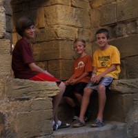 Following dinner in Domme, the boys sit where sentries once protected the city.