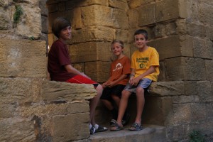 Following dinner in Domme, the boys sit where sentries once protected the city.
