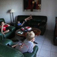 The boys watching rhythmic gymnastics qualifying rounds ... on French television.