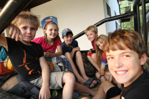 Peter, Suuzanne, and Sahale treat our boys to life riding without a roof.